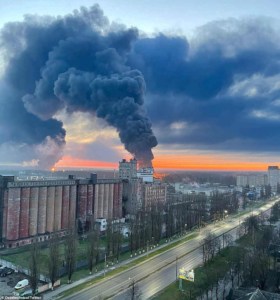 57011905 10749921 Two columns of thick black smoke rise into the morning air over a 6 1650879889222