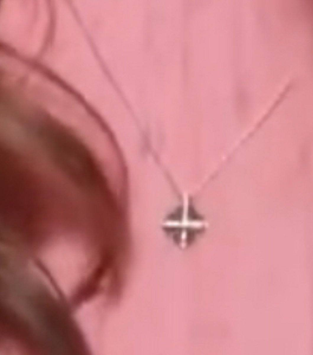 melinda gates upside down cross 1