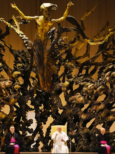 pope francis weird statue behind