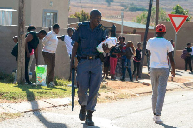 2 Killed, 50 Arrested, Even Cops Turn to Looting in South Africa Hell Riots 2 SA Looter Cop