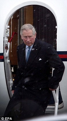 The Green Hypocrites: Prince Charles and Brown take separate jets... to lecture the World on Global warming 1 Cold comfort: Charles steps from jet into snow in Copenhagen