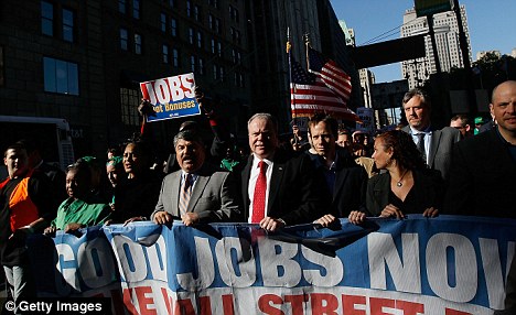 AFL-CIO president Richard Trumka (centre) led a protest march against Wall Street down Broadway in lower Manhattan yesterday