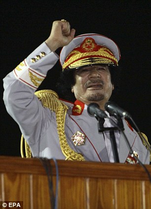 Gaddafi flees Tripoli as protesters set the Libyan parliament building alight 24 article 1358972 0A02C32D000005DC