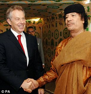 Gaddafi flees Tripoli as protesters set the Libyan parliament building alight 18 article 1358972 0D1362D8000005DC