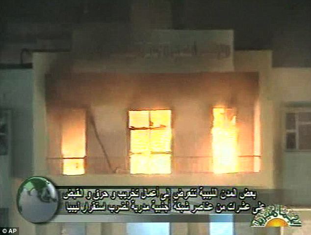 Gaddafi flees Tripoli as protesters set the Libyan parliament building alight 12 article 1358972 0D487CFB000005DC