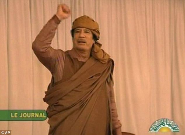 Gaddafi flees Tripoli as protesters set the Libyan parliament building alight 11 article 1358972 0D489CBE000005DC