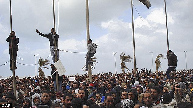 Gaddafi flees Tripoli as protesters set the Libyan parliament building alight 4 article 1358972 0D49029F000005DC