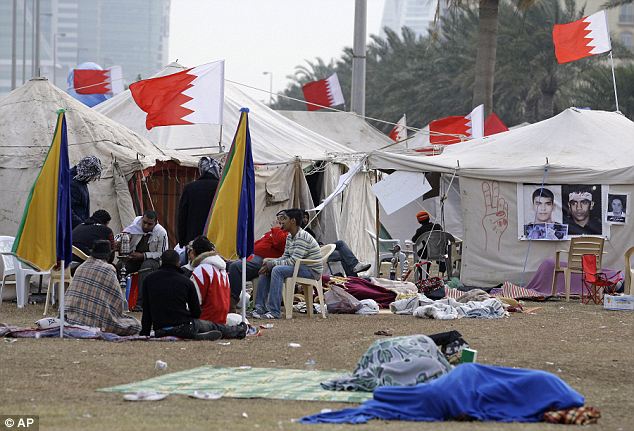 Gaddafi flees Tripoli as protesters set the Libyan parliament building alight 21 article 1358972 0D49FA9C000005DC