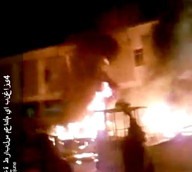 Gaddafi flees Tripoli as protesters set the Libyan parliament building alight 1 article 1358972 0D4AF229000005DC