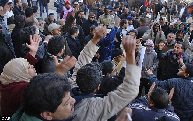Gaddafi flees Tripoli as protesters set the Libyan parliament building alight 8 article 1358972 0D4B28DE000005DC