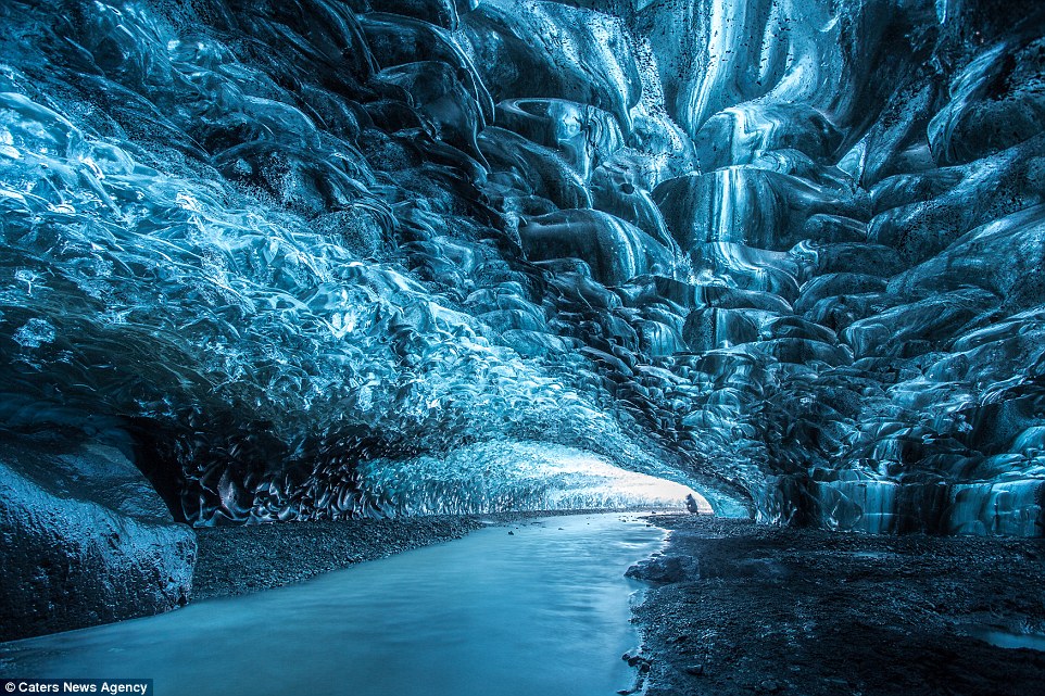 Iceland's Stunning Crystal Cave, Emerald Blue Ice mixed with Volcanic Ash 2 26AA74B300000578 2995579 image a 1 1426414527000