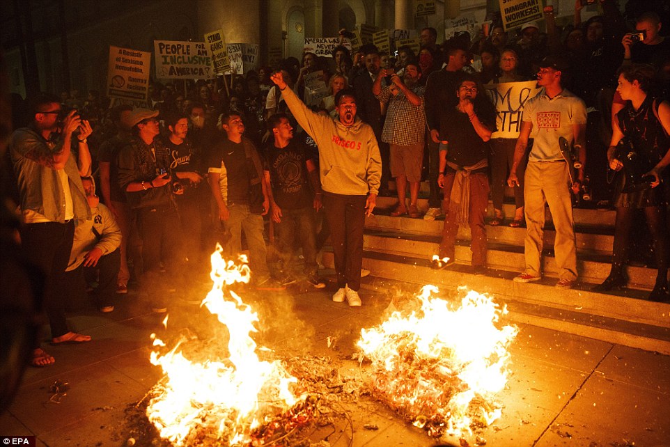 3A389D3600000578 3922098 Los Angeles Protesters lit fires on the steps of City Hall in Lo a 1 1478776851414